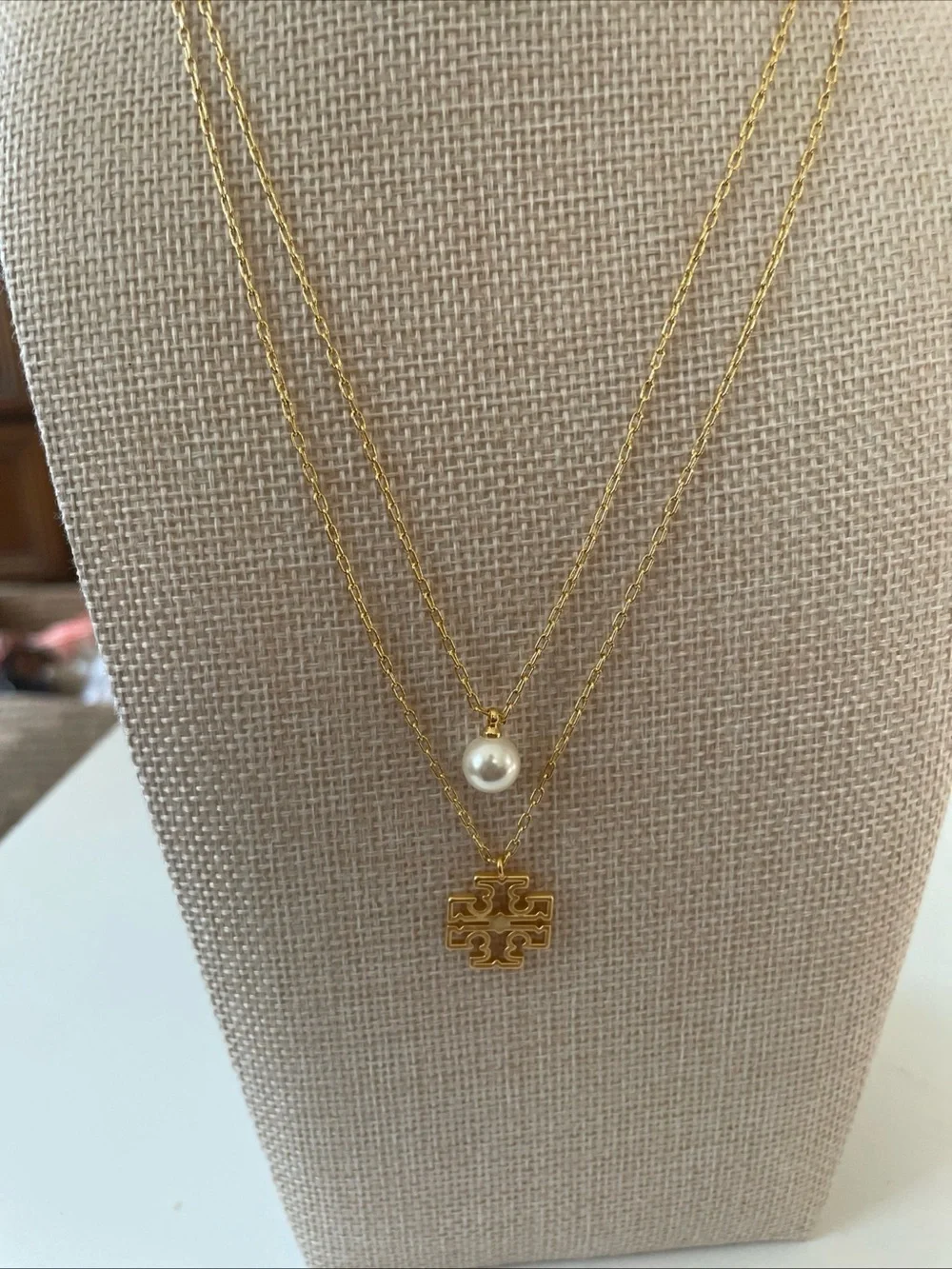 Tory Burch Gold Layered Necklace with White Pearl and Logo Pendant